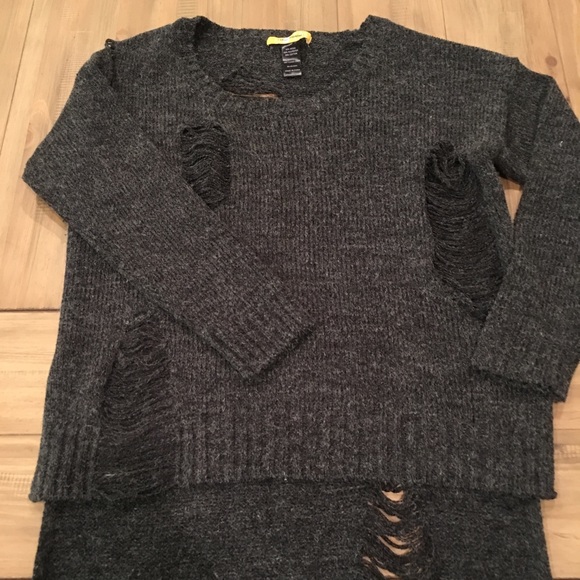 Ripped sweater. - Picture 3 of 4